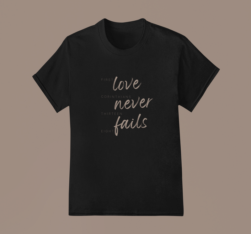 LOVE NEVER FAILS TEE